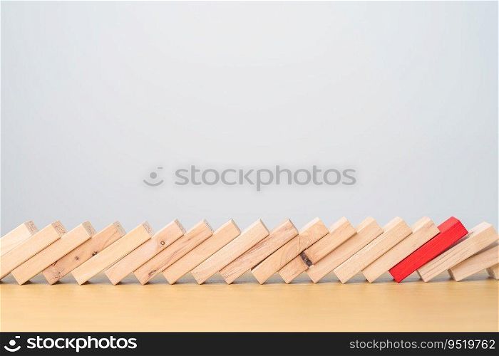 wood domino blocks falling on table. Crisis, fall Business, Risk management, Economic recession, Strategy and solutions concept