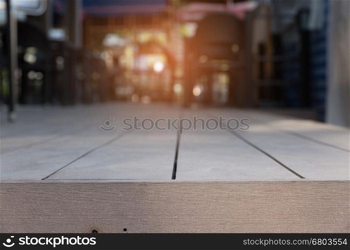 wood floor with background of table and chair in cafe restaurant