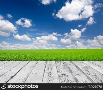 Wood floor with cloud sky background