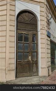 Wood front door of ancient house in the Ruse town, Bulgaria