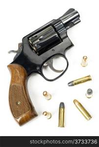 Wood Handled Revolver 38 Caliber Pistol Loaded Laying With Bullets
