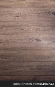 Wood laminate background at floor texture. Brown flooring laminate top view