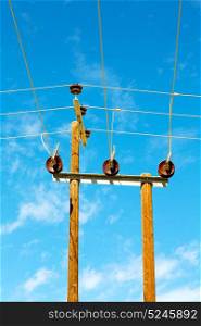 wood pylon energy and current line in oman the electric cable