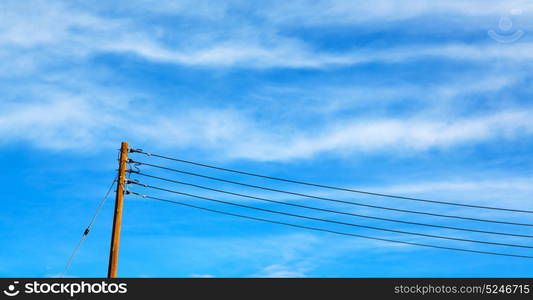 wood pylon energy and current line in oman the electric cable