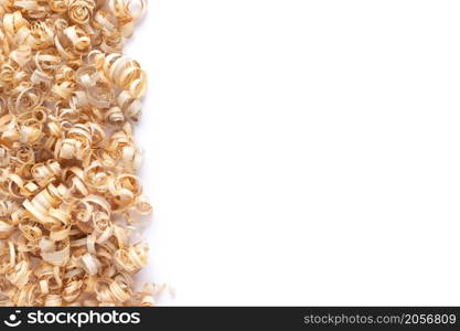 Wood shavings isolated on white background. Wooden shaving from old plank board texture