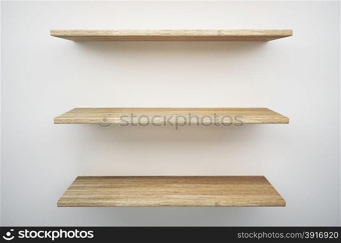 wood shelf on white wall