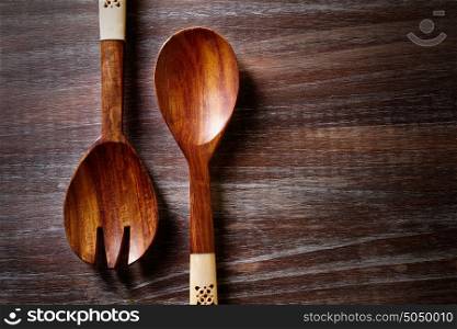 wood spoon and fork on wooden board kitchen tools
