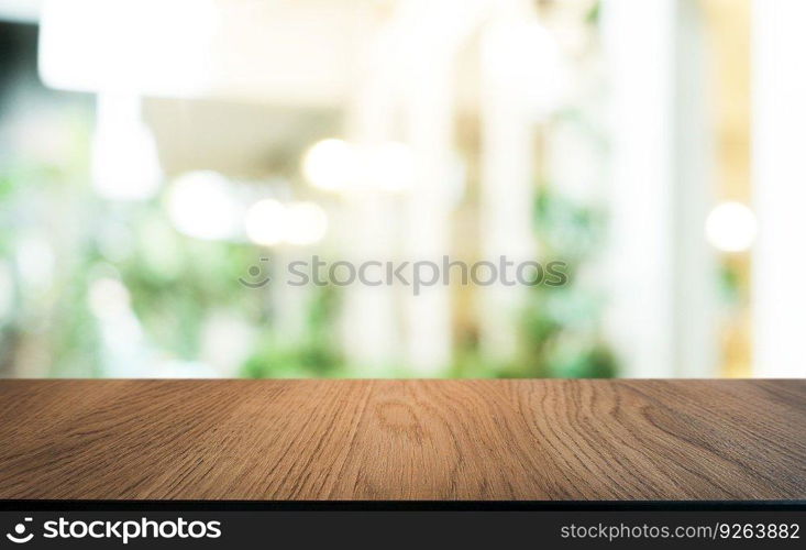 Wood Table Top in Blur Background room interior with empty copy space 