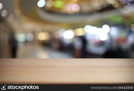 Wood table top in front of abstract blurred background. Empty wooden table space for text marketing promotion. blank wood table copy space for background