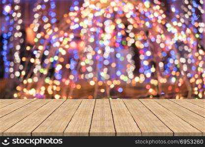 wood table top on colorful blurred background,space for montage product