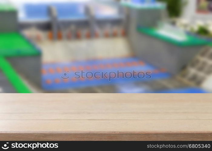 wood table with dam model background for display your product