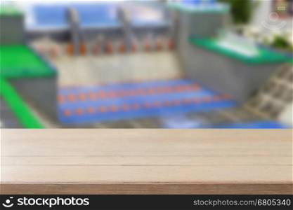 wood table with dam model background for display your product