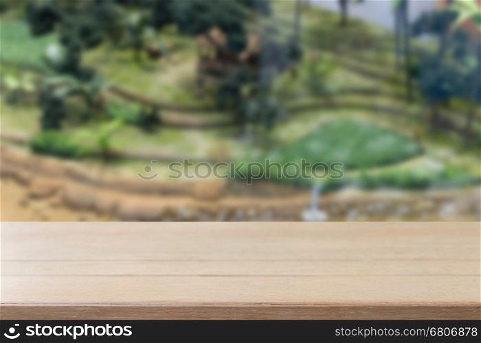 wood table with field and river in rural model for montage or display your product