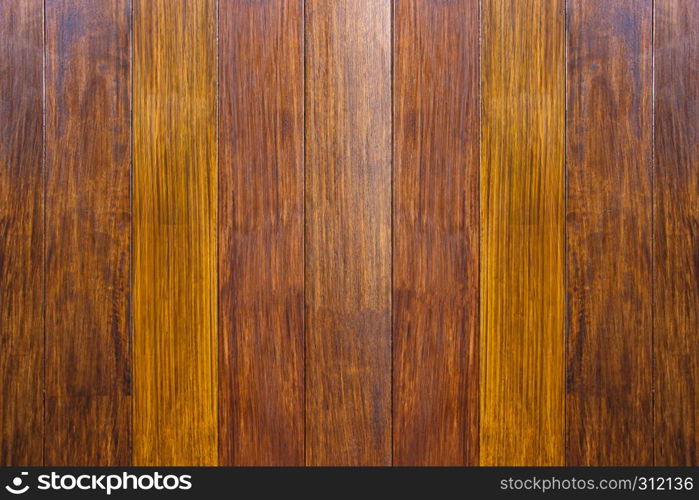 Wood texture. The surface of dark the brown natural wooden background for design decoration interior and exterior.
