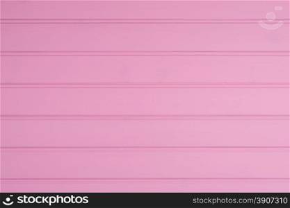 wood texture with pink color background.