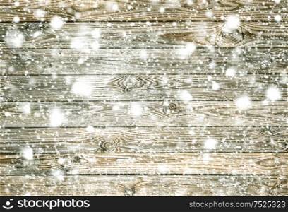 Wood texture with snow. Wooden background. Winter holidays