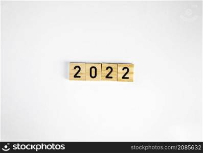 woodblocks cubes with a number 2022 in white isolated background with copy space. image banner size. new year 2022 concept. space for text. woodblocks cubes with a number 2022 in white isolated background with copy space. image banner size. new year 2022 concept.