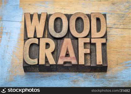 woodcraft - word abstract in vintage letterpress wood type against grunge wood