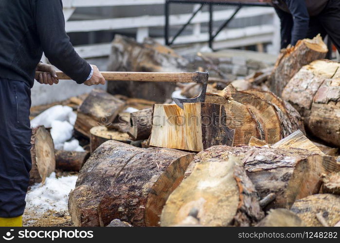 Woodcutters who break wood with an axe in Turkey