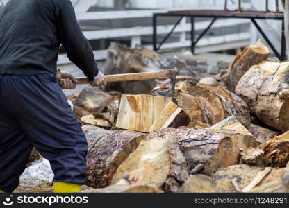 Woodcutters who break wood with an axe in Turkey