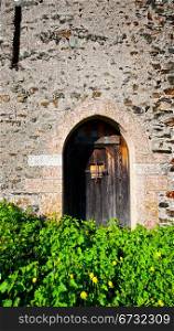 Wooden Ancient Italian Door in the Historic Fortress