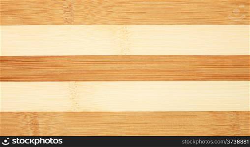 Wooden background of striped dark and light boards