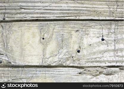wooden background with holes and stripes