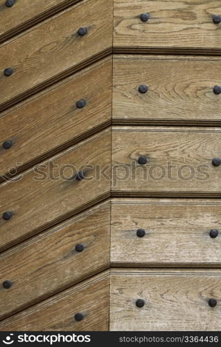 wooden background with iron rivets. wooden background or texture with iron rivets