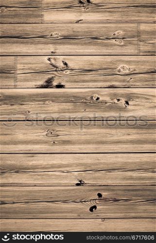 Wooden background with weathered wood and rusty nails.