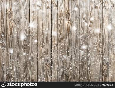 Wooden background. Wood texture with falling snow effect. Winter holidays