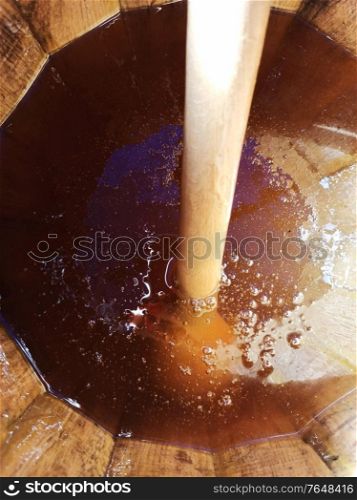 wooden barrel of fresh honey
