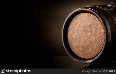 Wooden barrel on a background of brown texture