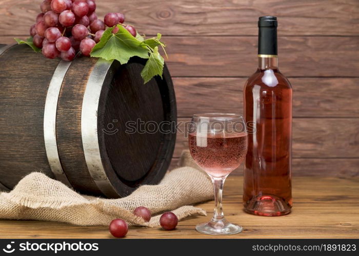 wooden barrel with bottle glass wine. Resolution and high quality beautiful photo. wooden barrel with bottle glass wine. High quality and resolution beautiful photo concept