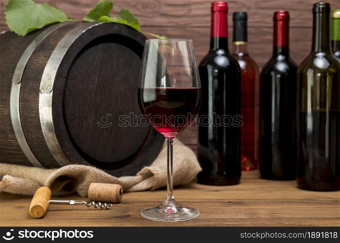 wooden barrel with bottles glasses wine. Resolution and high quality beautiful photo. wooden barrel with bottles glasses wine. High quality and resolution beautiful photo concept