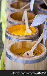Wooden Barrel with honey, close up