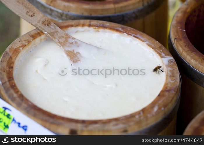 Wooden Barrel with honey, close up