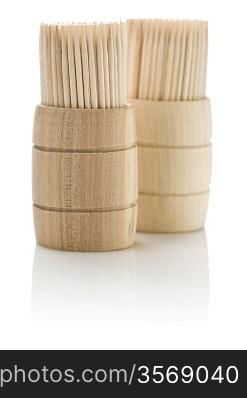 wooden barrels with toothpicks isolated