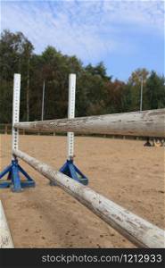 wooden barriers for jumping horses. hurdle in show jumping