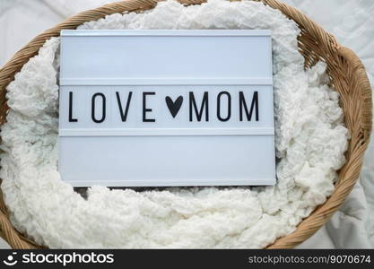 Wooden basket with fabric and mom love sign