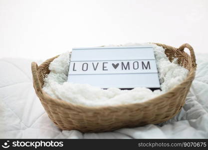 Wooden basket with fabric and mom love sign