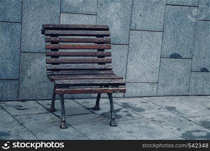 wooden bench in the street in the park