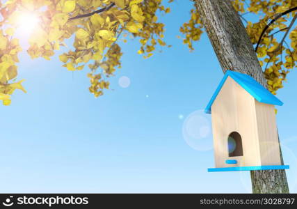 Wooden birdhouse under autumn tree in blue sky background with copy space, 3D rendering