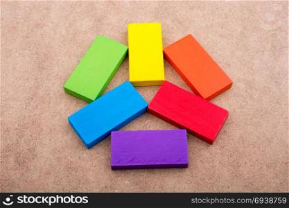 Wooden blocks on a brown background
