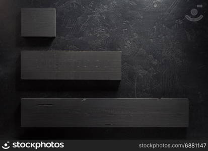 wooden board at black background texture