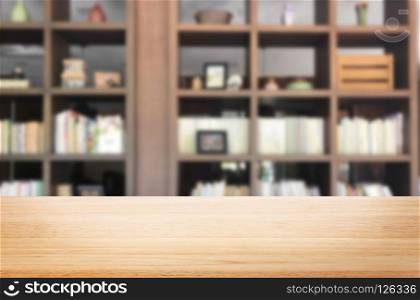 Wooden board empty table space platform in front of blurred library Of The background - can be used for display or montage your products. Mock up for display of product
