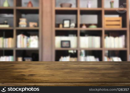 Wooden board empty table space platform in front of blurred library Of The background - can be used for display or montage your products. Mock up for display of product