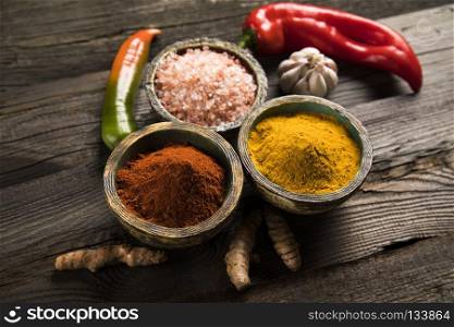 Wooden bowl, Hot spices. Hot spices in wooden bowls