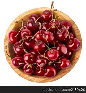 wooden bowl of sweet cherry fruits isolated on white background.. wooden bowl of sweet cherry fruits isolated on white background