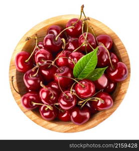 wooden bowl of sweet cherry fruits isolated on white background.. wooden bowl of sweet cherry fruits isolated on white background