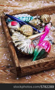 wooden box with a set of old Soviet glass toys